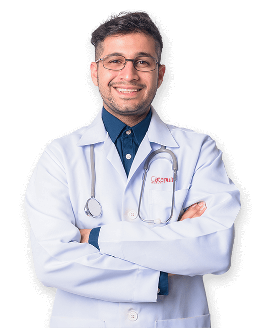 Man Smiling in Lab Coat