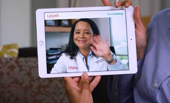 Nurse Practitioner on Tablet Waving